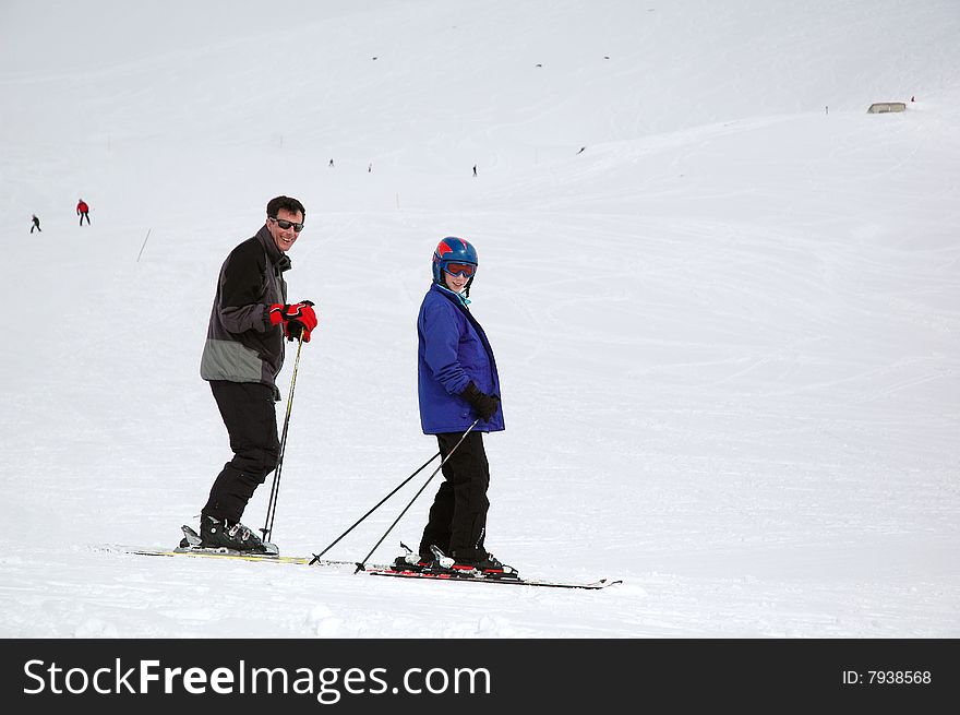 Portrait of father and daughter on ski slopes. Portrait of father and daughter on ski slopes