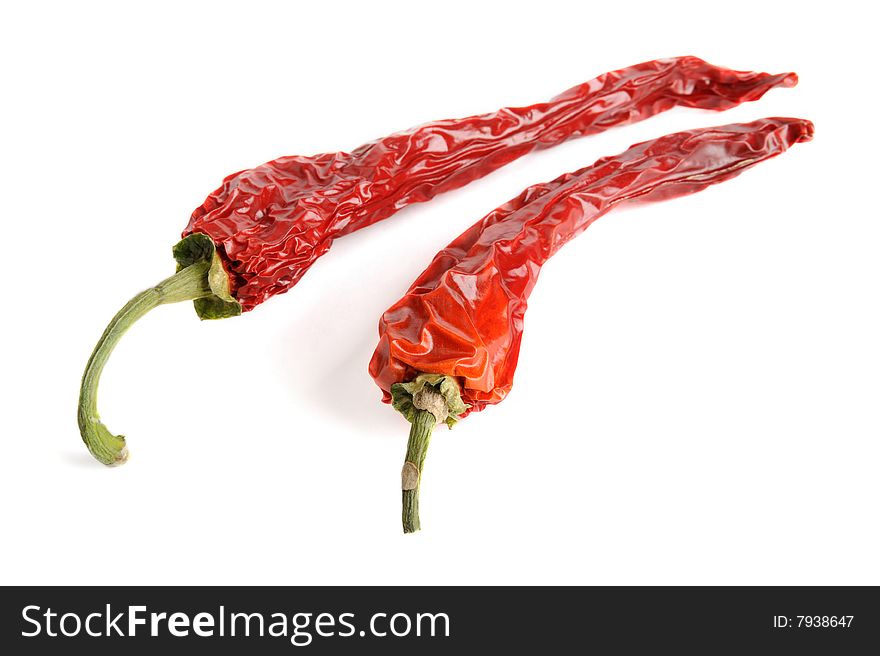 Dried red hot chili pepper isolated on white. Dried red hot chili pepper isolated on white