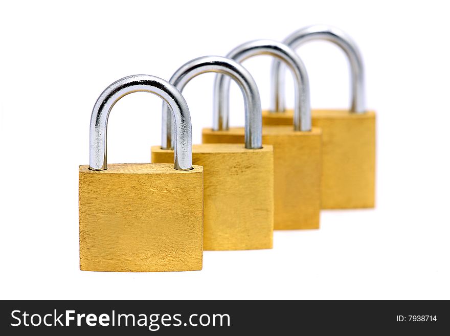 Four golden locks put side by side over white background.