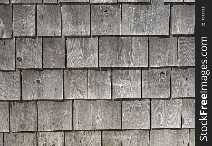 Interesting texture of a wall with shingles.