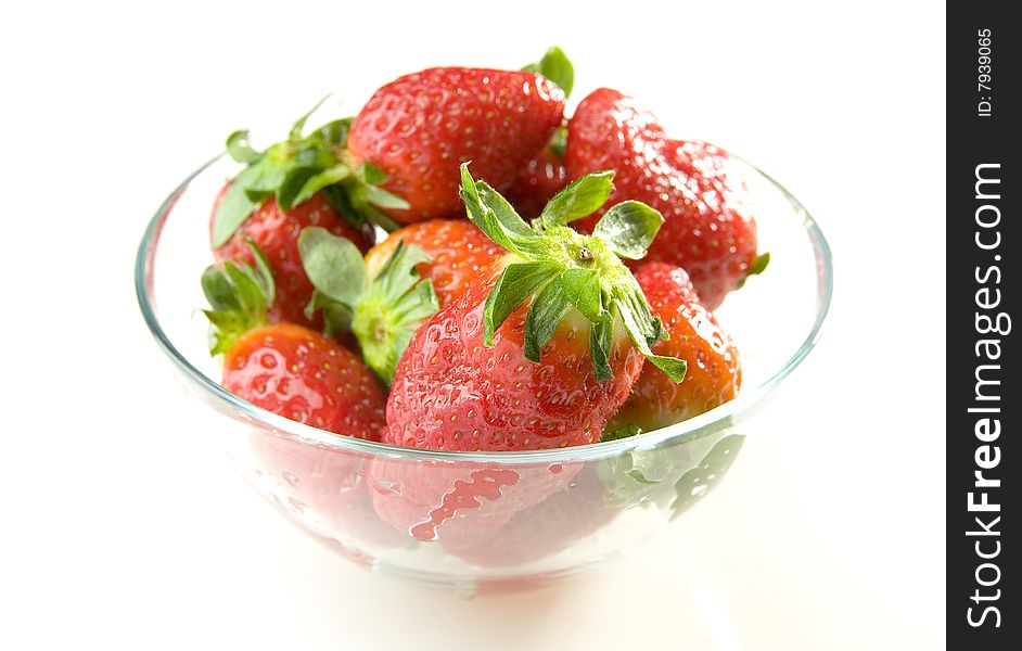 Fresh Strawberries in bowl on white ground