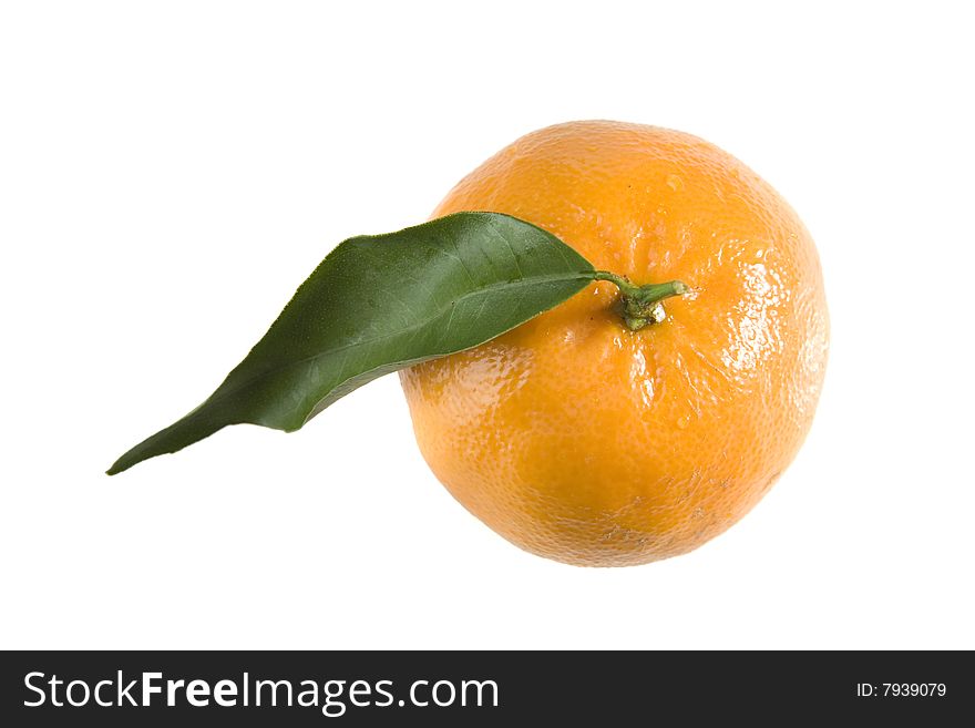 Orange tangerine with leaf on white ground