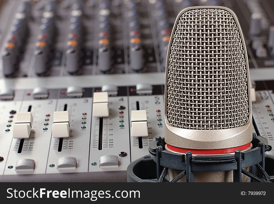 Microphone in sound studio on a white background