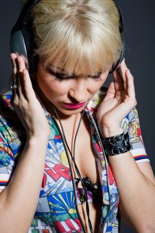 Fashion Woman Listening Music In Headphones Stock Photo Fashion Woman Listening Music In Headphones Stock Photo