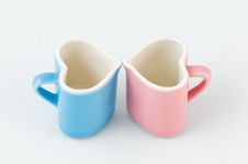 Two Heart-shape Cups On White Background Royalty Free Stock Photos Two Heart-shape Cups On White Background Royalty Free Stock Photos