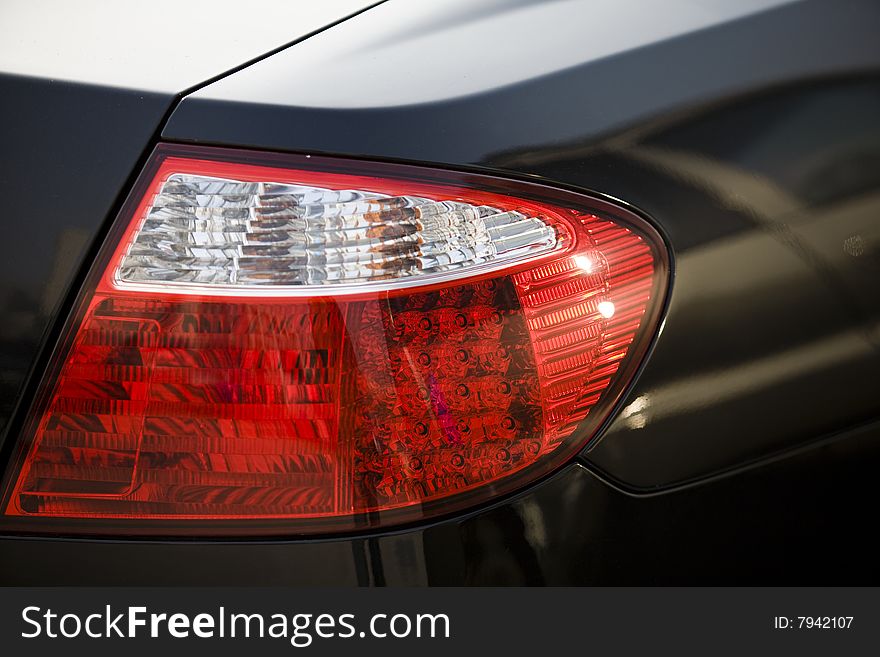 Tail light close up. Tail ligh automobile part. Tail light close up. Tail ligh automobile part.