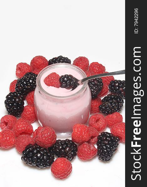 Yogurt with Blackberry and raspberries on white background. Yogurt with Blackberry and raspberries on white background