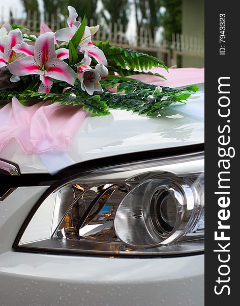 Weddings simulated flowers on the hood of car. Weddings simulated flowers on the hood of car