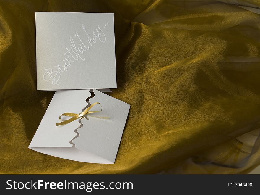 Handmade Invitation On Gold Silk Background