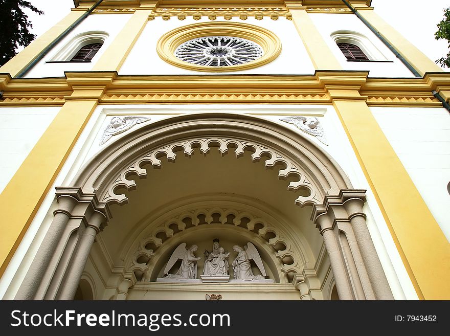 Medieval church in Prague (view of facade throwing back the head)