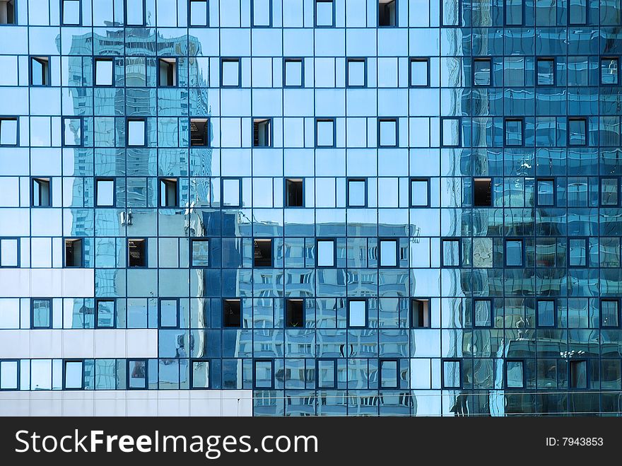 Modern building on the blue sky. Modern building on the blue sky