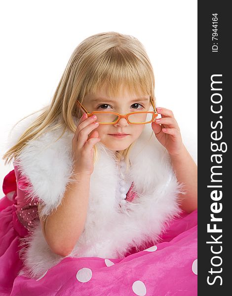 Little girl wearing glasses, white boa, and a pink dress on a white background. Little girl wearing glasses, white boa, and a pink dress on a white background.