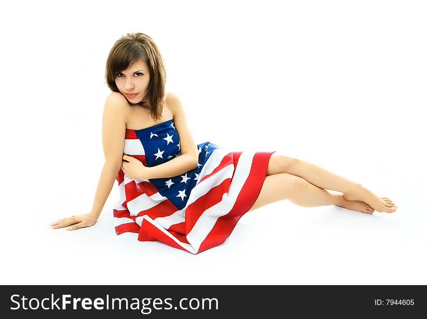 Sexy woman wrapped into the American flag