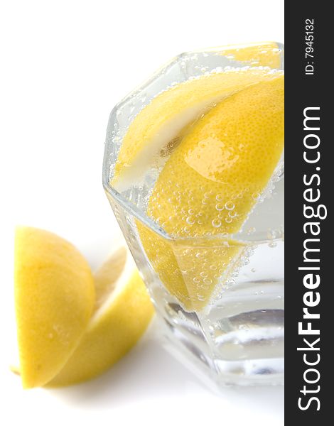 Soda water and lemon slices