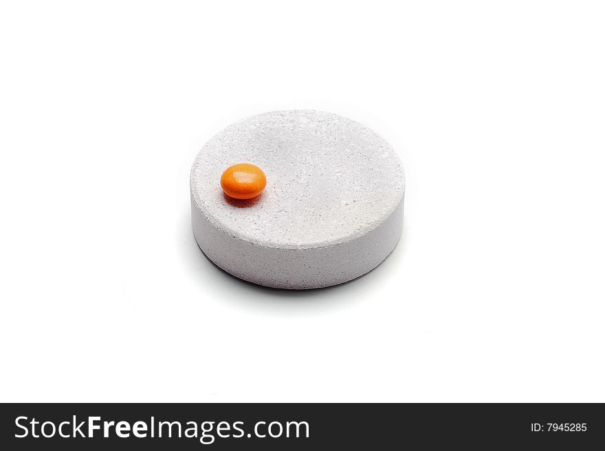 Giant Tablet And Small Pill