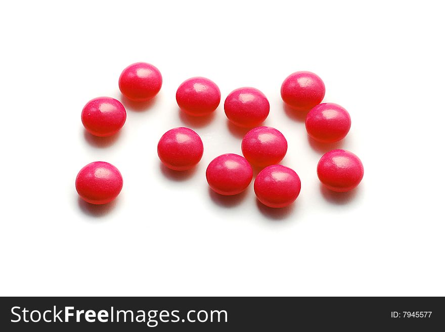 Red pills isolated on white