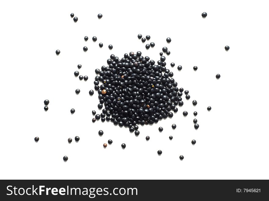 Black lentil isolated on white