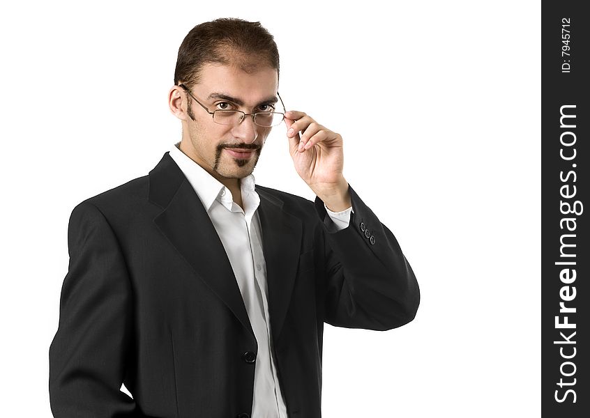 Portrait of a young businessman standing against white background