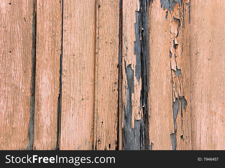 Weathered wooden wall with chipping paint