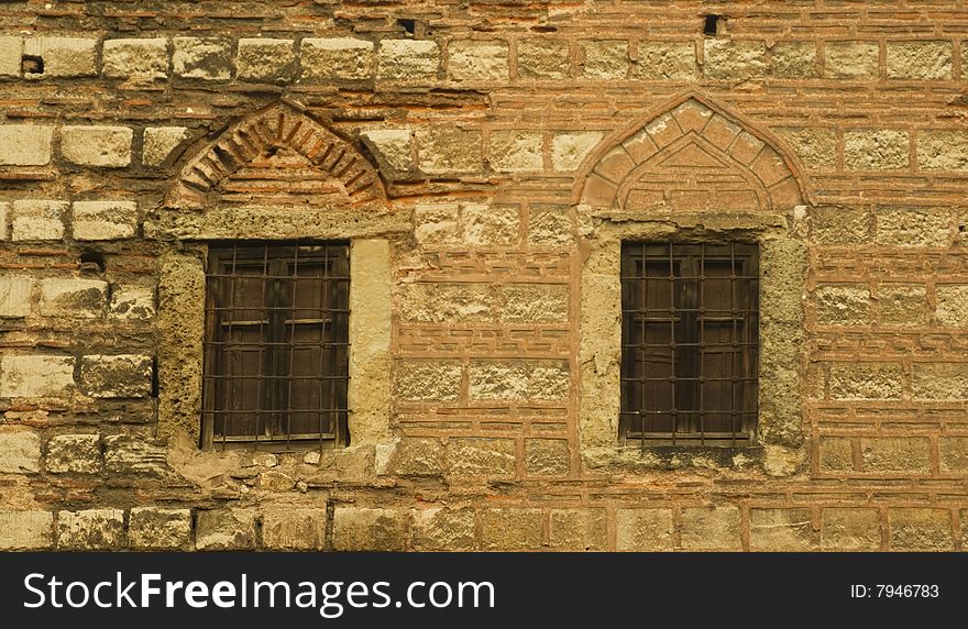 Arabesque style windows on the old wall