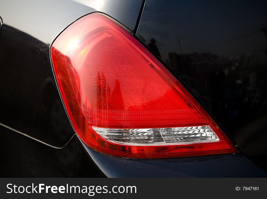 Tail light close up. Tail ligh automobile part. Tail light close up. Tail ligh automobile part.