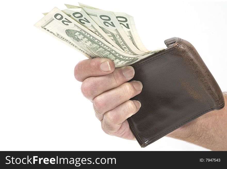 Studio shot isolated on white of a male hand gripping a worn leather wallet with four $20 bills. Studio shot isolated on white of a male hand gripping a worn leather wallet with four $20 bills.