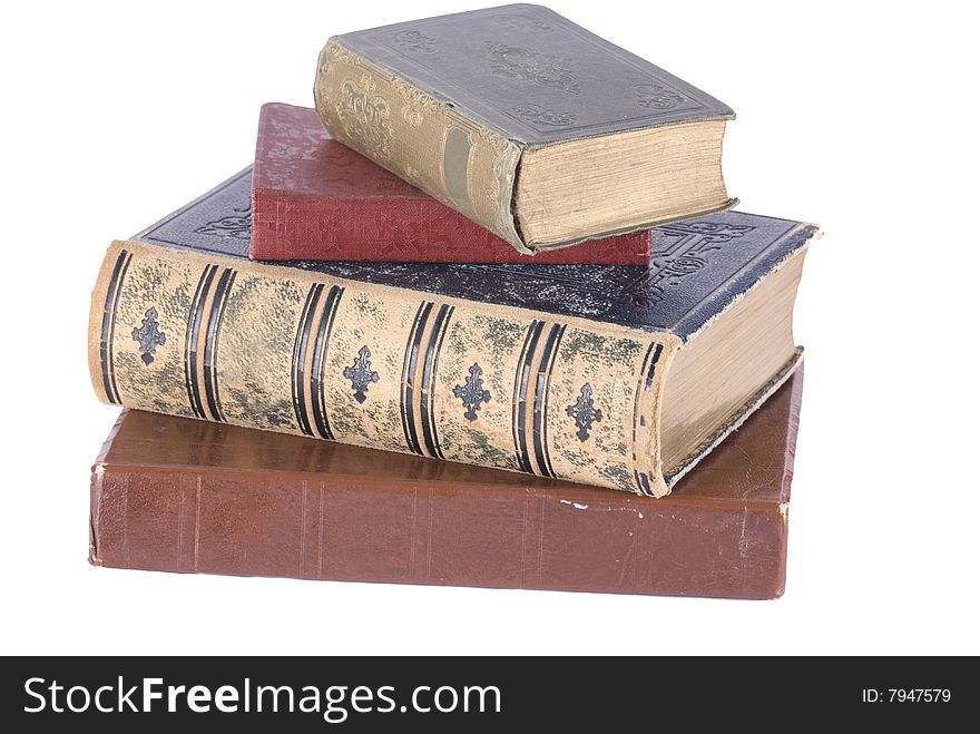 Stack of four old books isolated on white. Stack of four old books isolated on white.