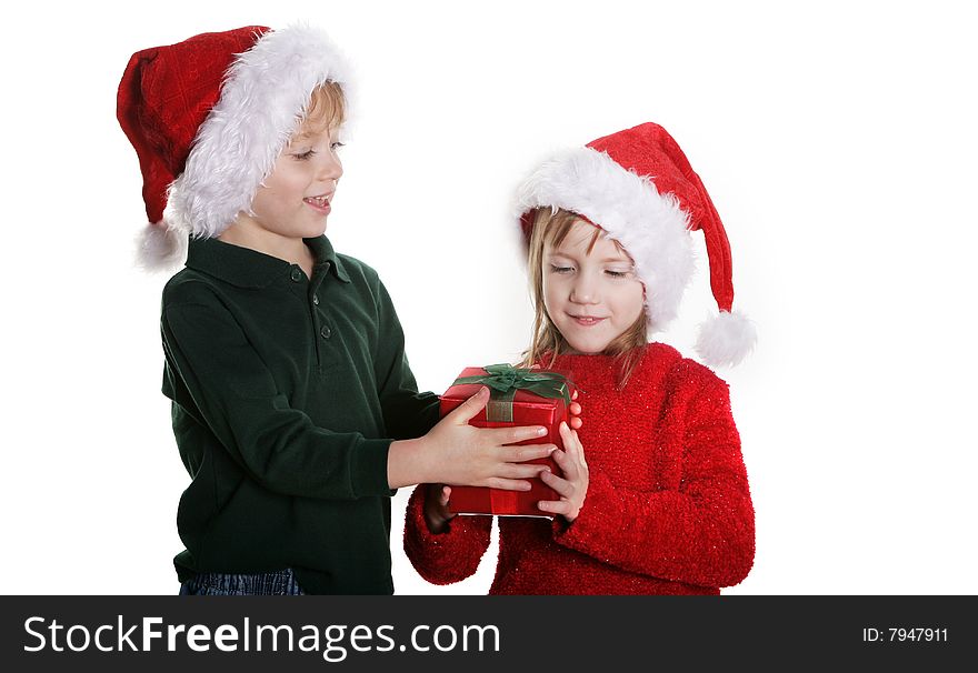 A boy giving a girl a present. A boy giving a girl a present