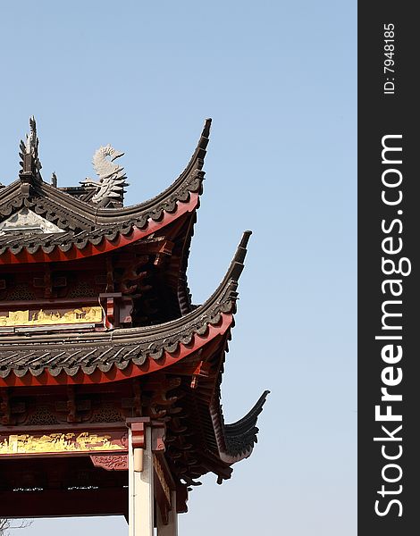 A chinese traditional pavilion in a park built by the local government. A chinese traditional pavilion in a park built by the local government