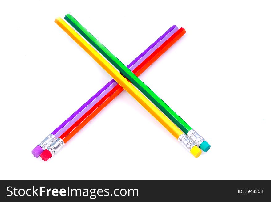 Colored pencils isolated on white.