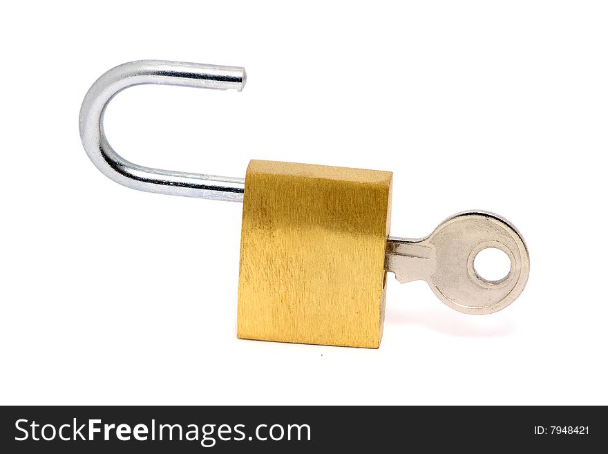 Golden lock with key isolated over white background.