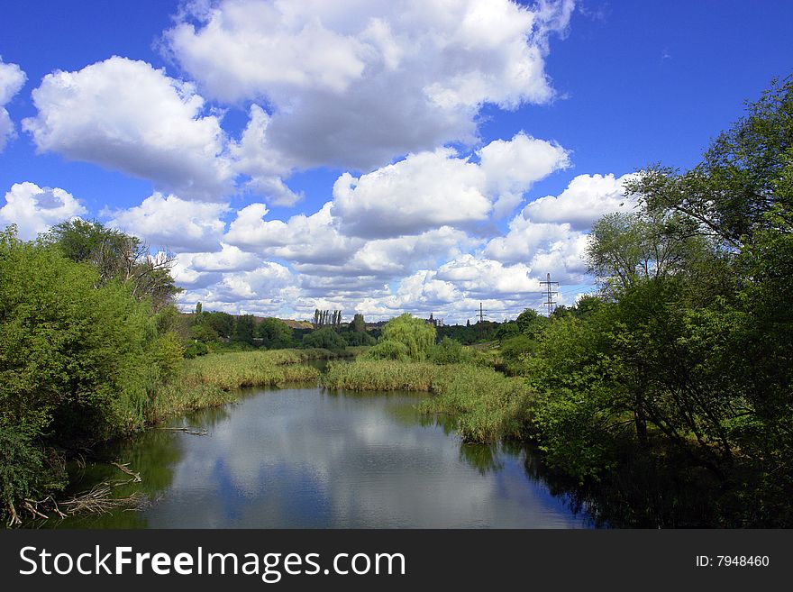 Heavenly landscape with small river