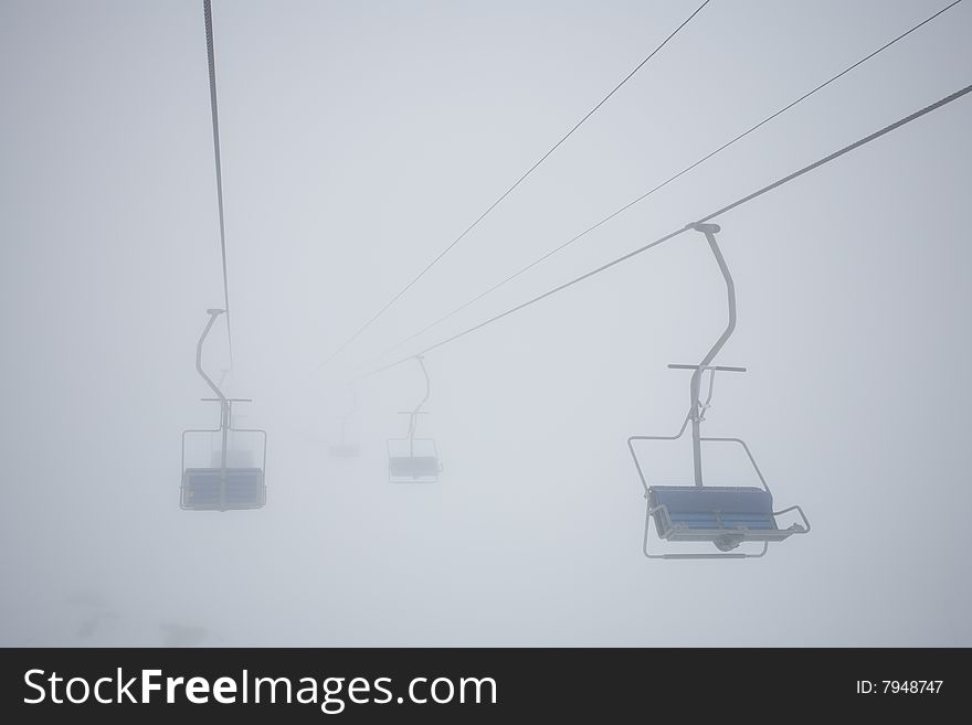 The chair seems to disappear in the fog. The chair seems to disappear in the fog.