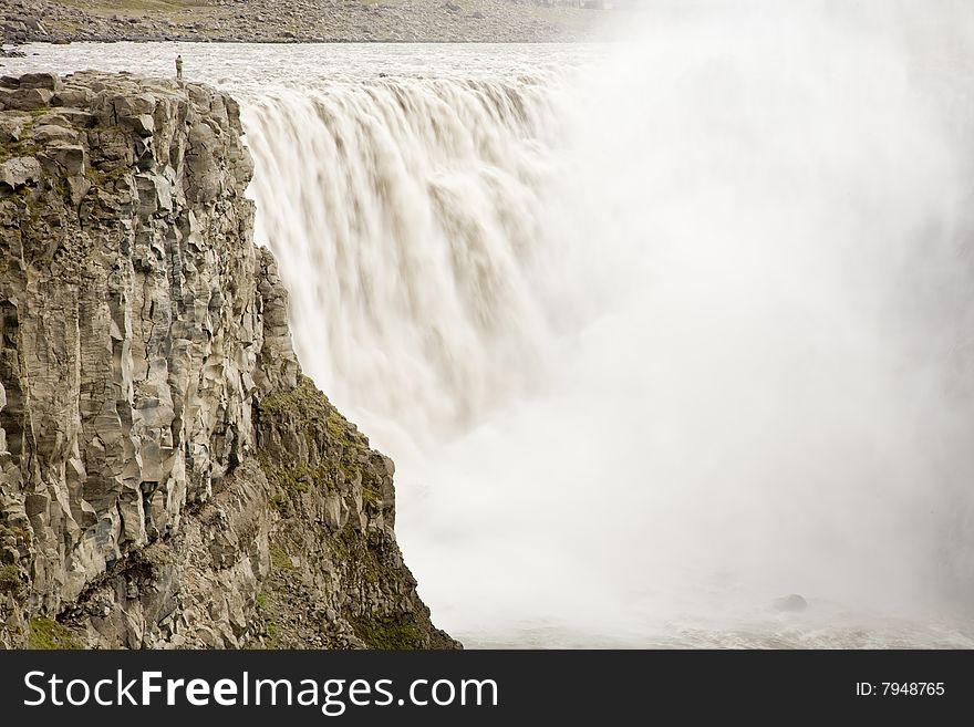 A powerful waterfall in northeast Iceland. A powerful waterfall in northeast Iceland.