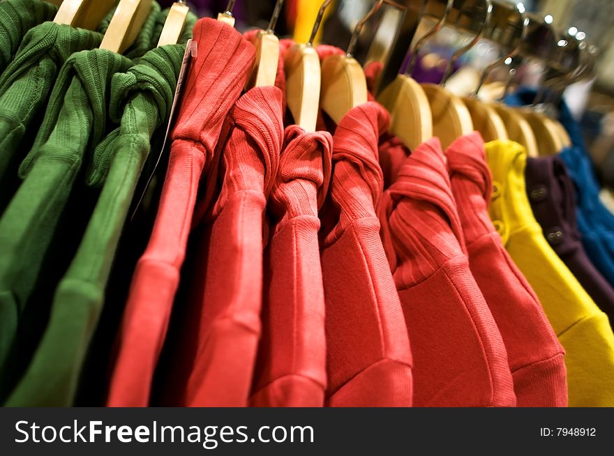 Colourful clothing on display for sale. Colourful clothing on display for sale