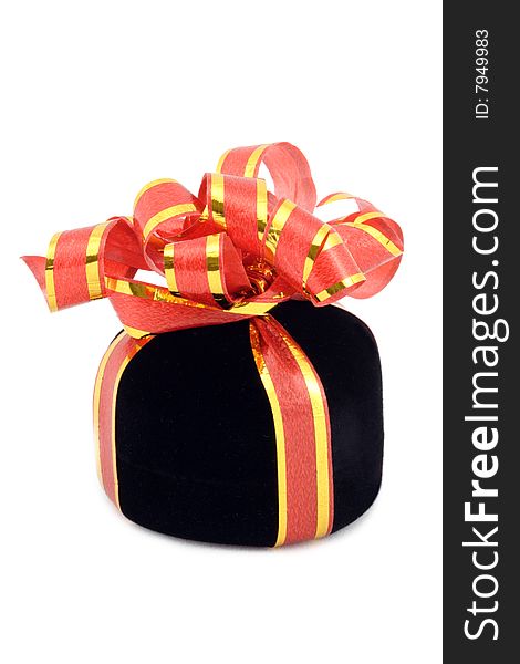 Black gift box with ribbon. Isolated. White background. Black gift box with ribbon. Isolated. White background.