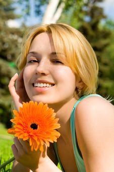 Woman Rest In The Park With Flower Royalty Free Stock Photography Woman Rest In The Park With Flower Royalty Free Stock Photography