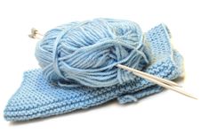 Two Knitting Needles, Woollen Yarn And Knitting. Stock Photography Two Knitting Needles, Woollen Yarn And Knitting. Stock Photography