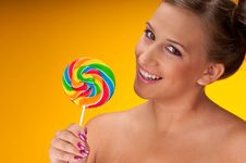 Smiling Brunette Woman With Big Lollipop Stock Image Smiling Brunette Woman With Big Lollipop Stock Image