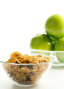 Cornflakes And Green Apples Stock Images