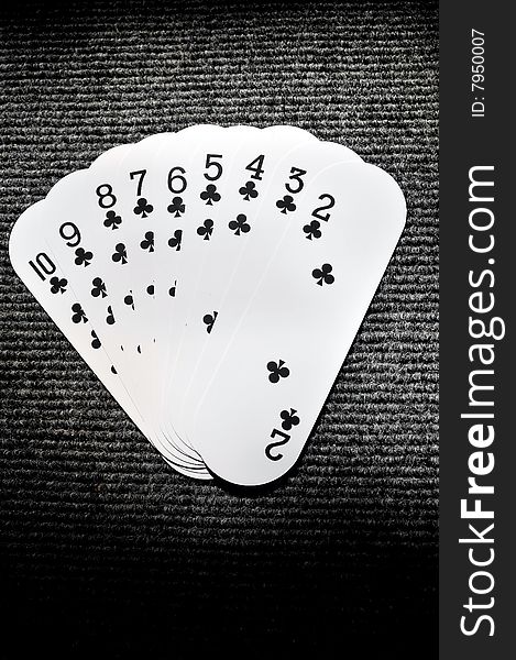 Playing cards isolated on black background.