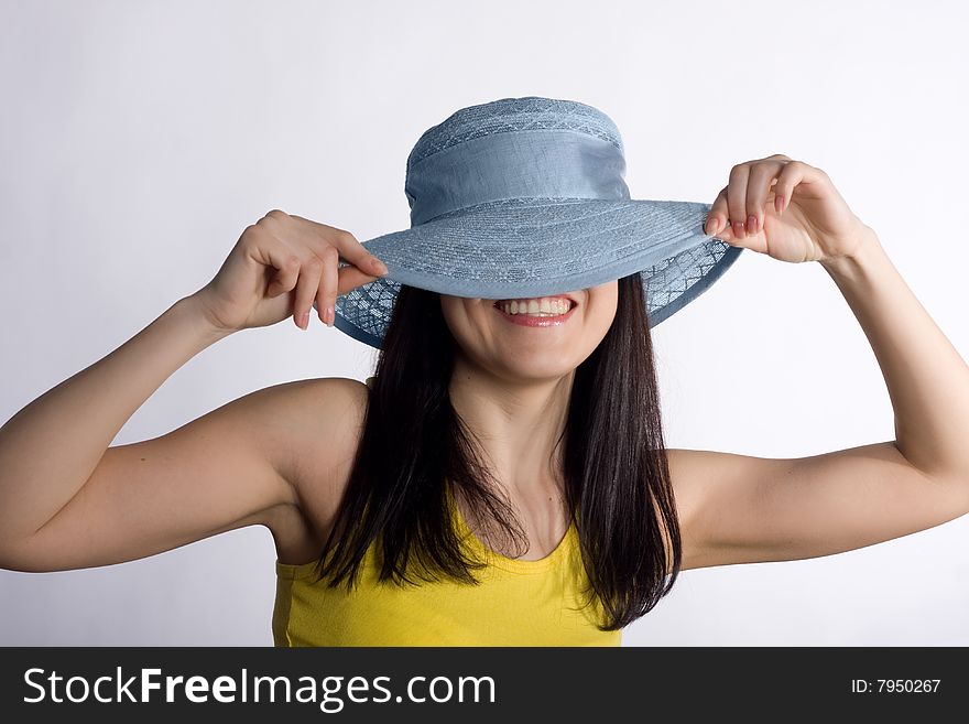 Girl in a summer hat