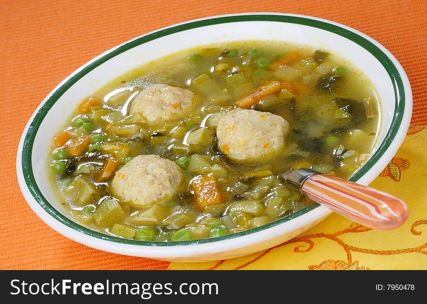 Vegetable soup with meat on plate