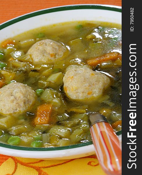 Vegetable soup with meat on plate