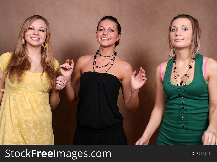 Three girls standing in studio. Three girls standing in studio