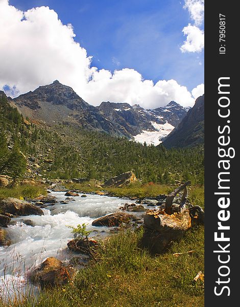 Water flowing in a mountain torrent. Water flowing in a mountain torrent