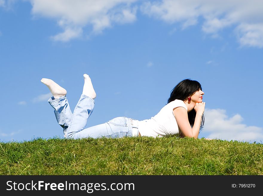 Woman Rest On The Green Grass