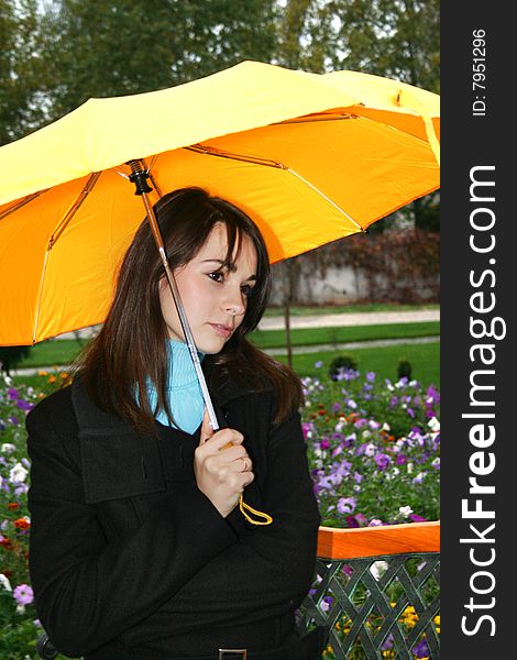 Beautiful woman holding a umbrella