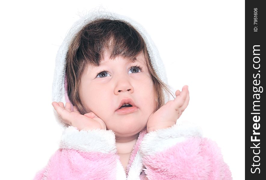 baby girl in pink bathrobe after taking a bath