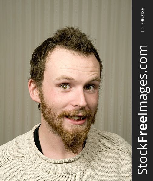 Young man with beard in wool jumper. Young man with beard in wool jumper